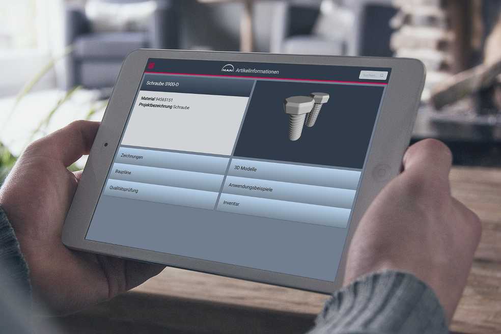 Auf einem iPad werden in der MAN Paperless Prototyp App Informationen zu einer Schraube angezeigt